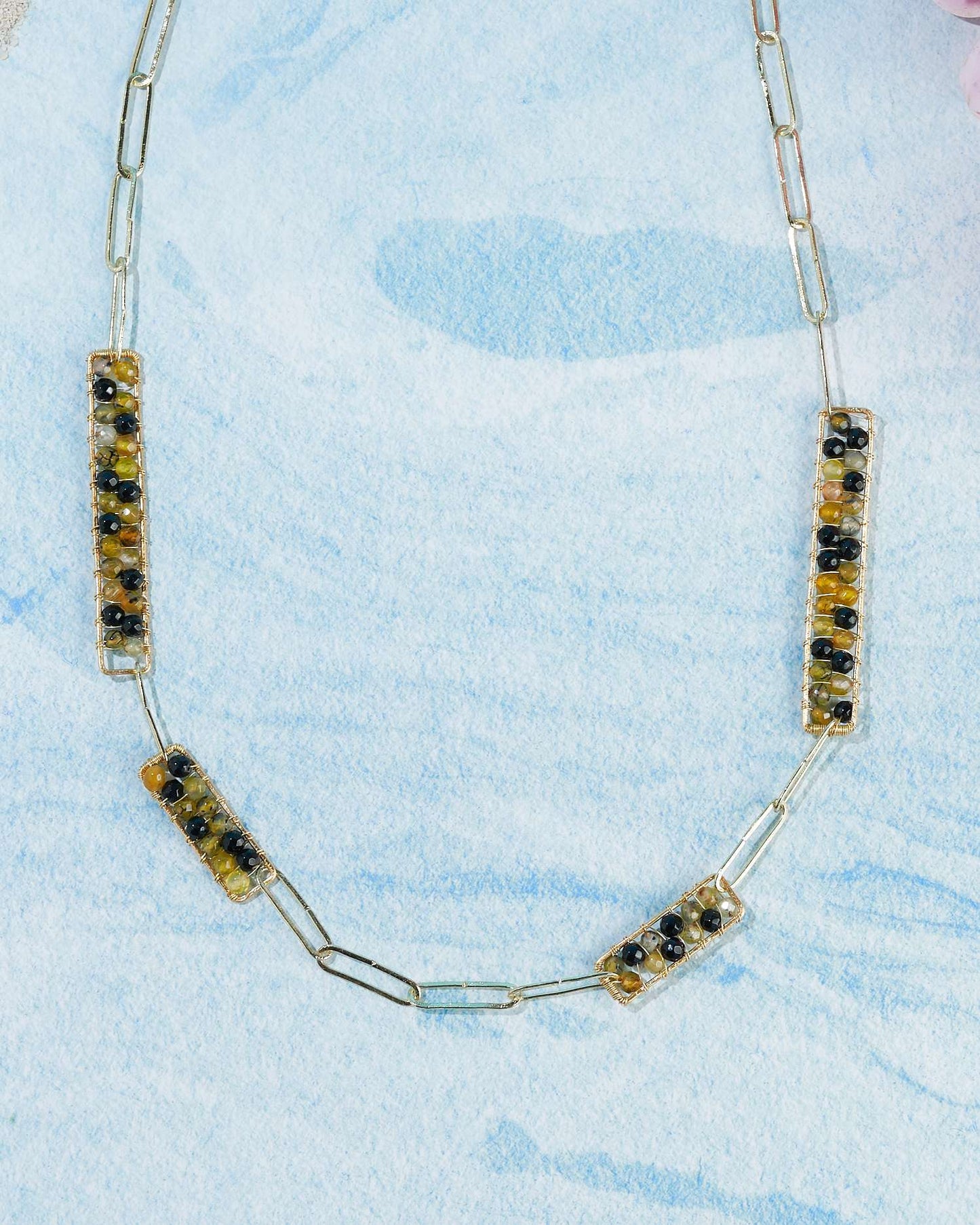 Santorini black yellow brass (01)